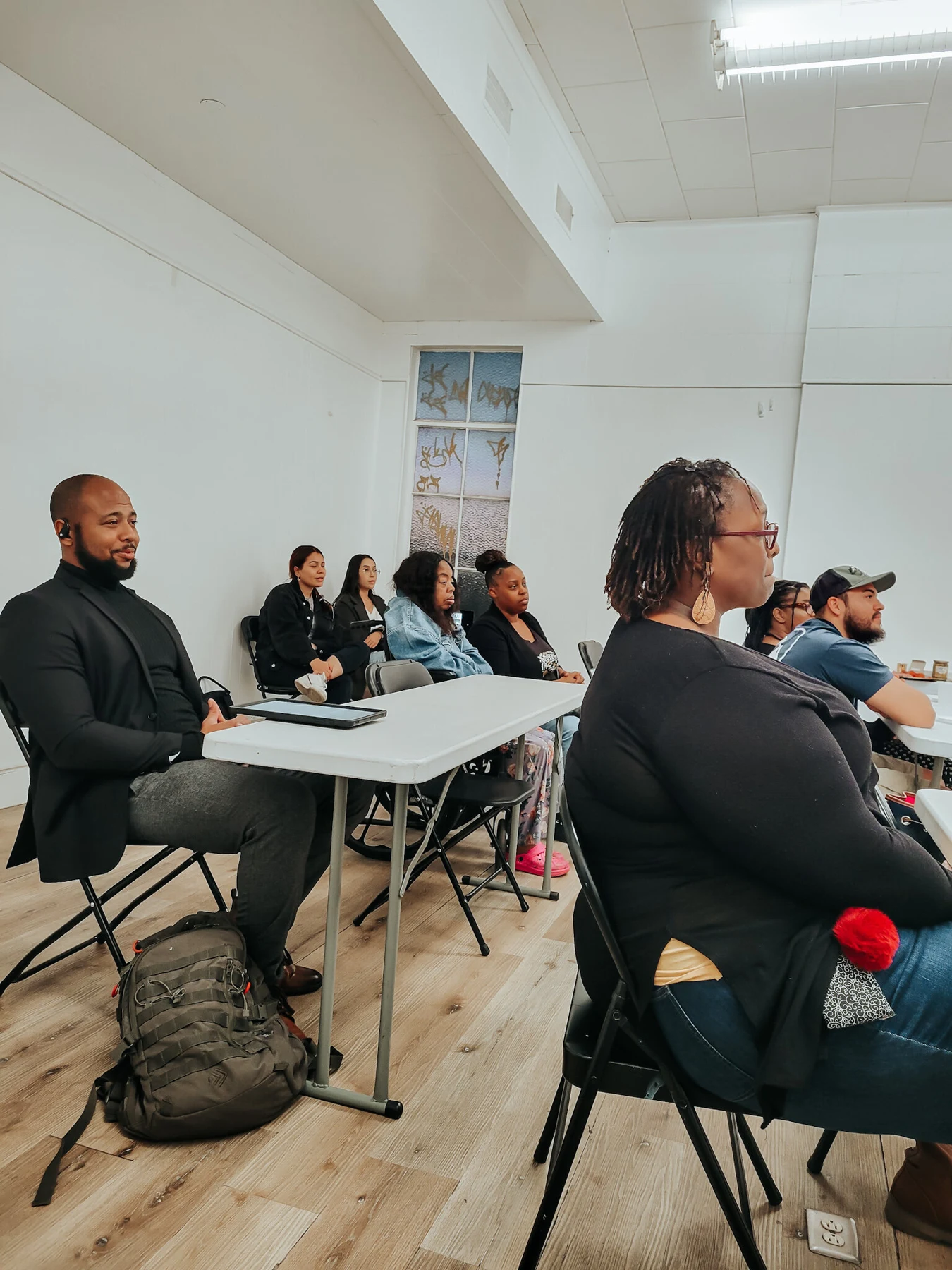 Participants listening together at a business workshop